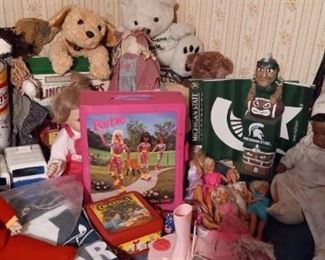 Assorted barbie, toys, Michigan state items