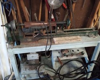 Smaller working lathe with bench and cutters