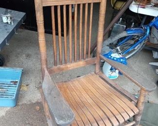 One of 2 wood rockers