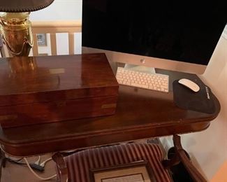 Nice gaming table, dated apple computer. 