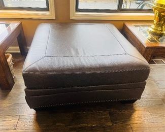 Large leather ottoman with nailhead trim