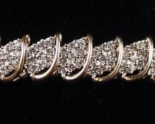 10K Gold Bracelet With Clear Stones, Possibly Diamonds, 7" Long, Approx 19.67 g Total Weight Including Stones