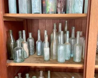 many bottles with lettering