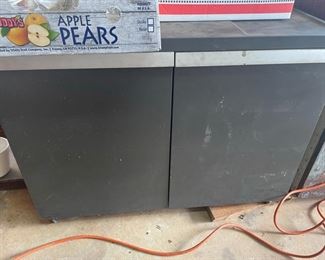 two metal storage cabinets