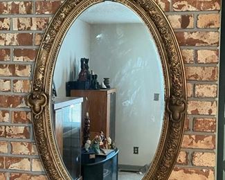 large antique oval mirror