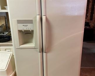 side-by-side off white refrigerator