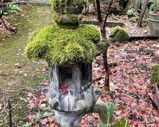 Concrete garden art with great moss 