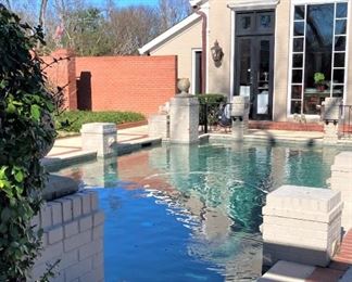 Be sure to enjoy the gardens, but no dipping in the pool!