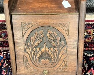 Solid wood antique coal scuttle with carved front panel