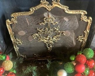 Antique French fire screen; Christmas garland