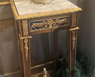 One of two very fine marble top antique tables