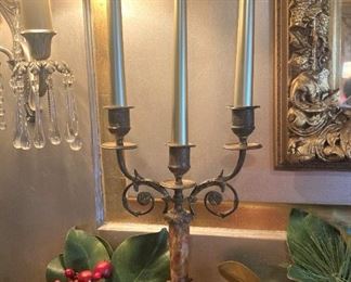 One of two matching brass candelabras 