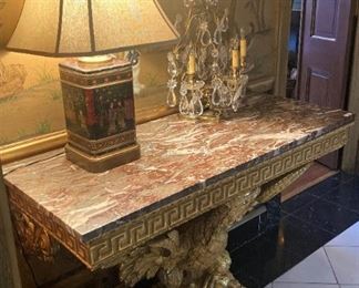 One of two marble top tables (attaches to the wall)