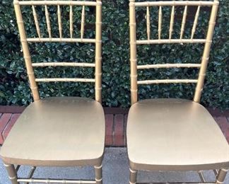 Two of 18 straight back chairs