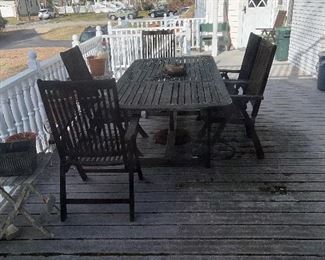 Folding Teak chairs and table, a little crispy