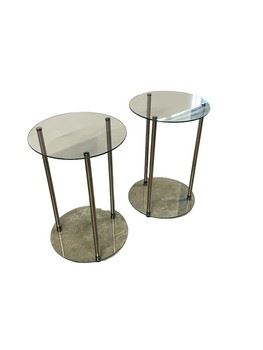 $50 USD     Designs2Go Classic Glass 2 Tier Round End Tables Glass Top JC155-20       Description: The sleek and modern style of the Designs2Go Classic Round End Table makes it perfect for updating your living room. This piece is crafted of stainless steel and tempered glass, and its two tiers offer ample storage and display space. 
Dimensions: 15.75 x 24"H     Weight = 10 lb
Condition: Used with minor signs of wear associated with use and age.  Please refer to pictures for more detail.
Location: Local pick up SW Portland, OR. Location is easy access in warehouse. Contact us for shipper suggestions.      https://goodbyhello.com/products/copy-of-laurier-clover-shaped-tufted-linen-ottoman-with-iron-base-jc155-19?_pos=22&_sid=a0dcecac8&_ss=r
