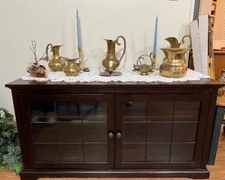 Gorgeous TV Entertainment center, and don't forget many of our beautiful Brass pieces!