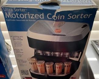 Motorized Coin Sorter, ps- it's better than keeping your change in your cupholder ;)