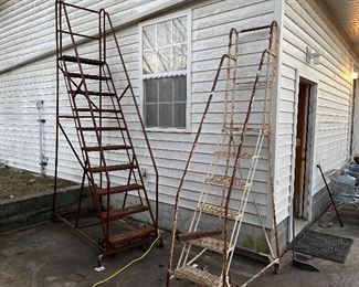 Two sets of portable stairs