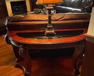 Curved wooden sofa table with glass top. 51.5"w x 27"h x 17.5"d. (Has matching coffee table and side tables.) Available for pre-sale starting 1/9/23. Text 615-854-8535 for more information and/or to arrange a time to view.