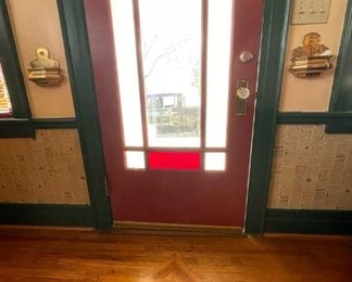 Brass holders on either side of the door -- great "catch-alls"!