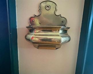 Brass holders on either side of the door -- great "catch-alls"!