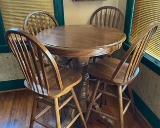 Bar height table with 4 bar height swivel chairs. 2 additional matching chairs also available.  Available for pre-sale starting 1/9/23. Text 615-854-8535 for more information and/or to arrange a time to view.