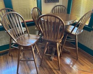 Bar height table with 4 bar height swivel chairs. 2 additional matching chairs also available.  Available for pre-sale starting 1/9/23. Text 615-854-8535 for more information and/or to arrange a time to view.