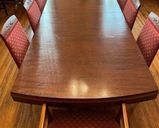 Landstrom Furniture Art deco 60-inch dining table with 3 - 11 inch leaves.  Six dining chairs and and two captains chairs apholstered in mauve/dusty rose pattern with green accent.  Has matching hutch and buffet. Available for pre-sale starting 1/9/23. Text 615-854-8535 for more information and/or to arrange a time to view.