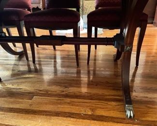 Landstrom Furniture Art deco 60-inch dining table with 3 - 11 inch leaves.  Six dining chairs and and two captains chairs apholstered in mauve/dusty rose pattern with green accent.  Has matching hutch and buffet. Available for pre-sale starting 1/9/23. Text 615-854-8535 for more information and/or to arrange a time to view.