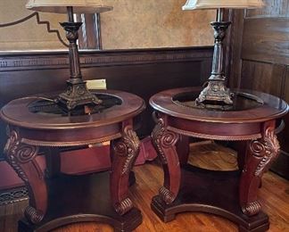 Pair of round wooden side tables with glass top. 25" diameter x 22"h. (Has matching coffee table and sofa table.) Available for pre-sale starting 1/9/23. Text 615-854-8535 for more information and/or to arrange a time to view.