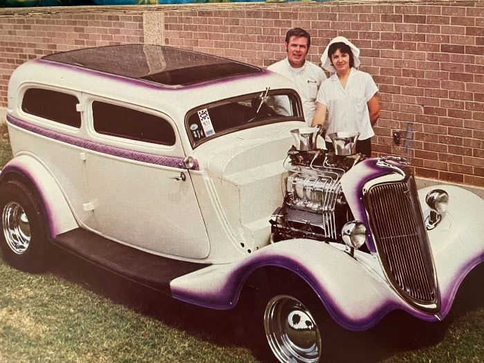 Welcome to the estate sale of Jim McPherson pictured here with one of his cars. 
While this ‘34 Ford beauty is not part of the estate sale, we wanted to show you the quality of Jim’s work to give you a feel for what his garage is like!