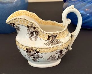 Vintage Staffordshire Creamer	4.25 inches high.	
