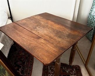 Old wooden two side drop leaf table	39 x 39. Leaf down 20 x 39.	

