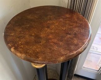 Wooden three column pedestal	42.5 inches tall 16 inches in diameter.	
