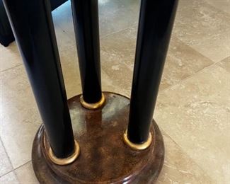 Wooden three column pedestal	42.5 inches tall 16 inches in diameter.	
