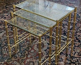 Three brass nesting tables	Biggest table dimensions 21, 13 x 20.5 middle table 19 x 13 x 18.5 smallest nesting table 17 x 13 x 17.5.	
