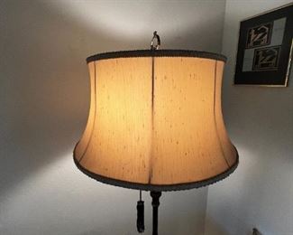 Solid, brass candlestick floor lamp	64 inches tall lampshade diameter,  19 inches	
