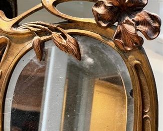 Art Deco solid brass mirror	17 inches tall 11 inches wide 6 inches deep	
