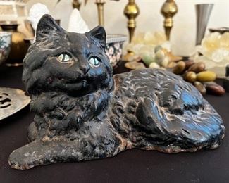 Old Cast iron cat door stop		

