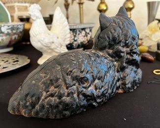 Old Cast iron cat door stop		
