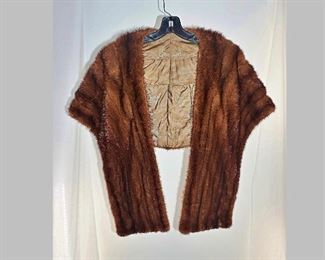 Vintage (c 1939) classic all natural Lunaraine brown mink fur stole/shawl.  This rare mint condition and exceptionally beautiful fur offers hand basted silk lining with embroidered monograms and two hidden pockets, each located internally, at the ends of the panels.
