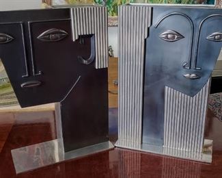 Pair of Art Deco Franz Hagenauer sculptural face chrome, nickel & copper vases or umbrella stands ? Measures approx. 21" tall by 14" wide.