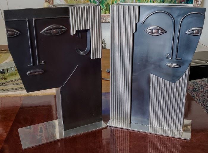 Pair of Art Deco Franz Hagenauer sculptural face chrome, nickel & copper vases or umbrella stands ? Measures approx. 21" tall by 14" wide.