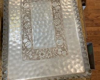 Pierced aluminum trays.