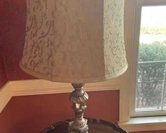 Lamp with mirrored panels on base.