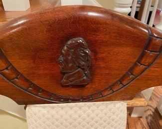 Wooden bench with George Washington carving (seat needs to be replaced).