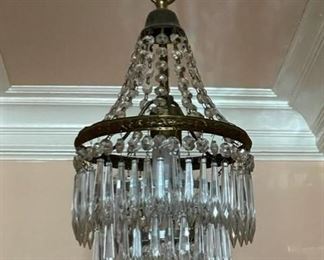$300 - Early 20th Century Three Tier Icicle Drop Crystal Chandelier JB59-3                                                                                      Description:  Gorgeous Ice Drop Vintage Crystal Chandelier.  Removed from a 1900 home in Washington, D.C. 

DETAILS + DIMENSIONS:17"H x 9"W

CONDITION: Please refer to photos for a more detailed look at condition. We make every attempt to list and photograph any defects or signs of wear that are significant to this sale.

Condition Desc. : Beautiful Condition

Local pick up only : Bethesda, MD.  Contact us for shipper suggestions.

Measurements

Length : 9
Width : 9
Height : 17
