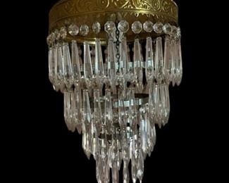 $200 - Exquisite Antique Neoclassical Four-Tiered Brass Flush Mount Chandelier JB59-4     - TWO AVAILABLE                                                                                                                                                       Description : Gorgeous antique four-tier Neoclassical flush mount chandelier with its original and nicely aged brass finish. The chandelier measures approximately 10″ wide and 14″ tall. Gorgeous antique four-tier Neoclassical flush mount chandelier with its original and nicely aged brass finish. Circa 1910, this two-light “wedding cake” chandelier features a scalloped band with intricate details in the form of bead-and-reel, volute, and floral accents. Below, the chandelier has four tiers of sparkling icicle prisms and is finished at the bottom with a faceted glass ball. This flush mount light fixture and its prisms are in excellent condition.

CONDITION: Please refer to photos for a more detailed look at condition. We make every atte