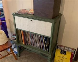 Vintage music cabinet full of vinyl records